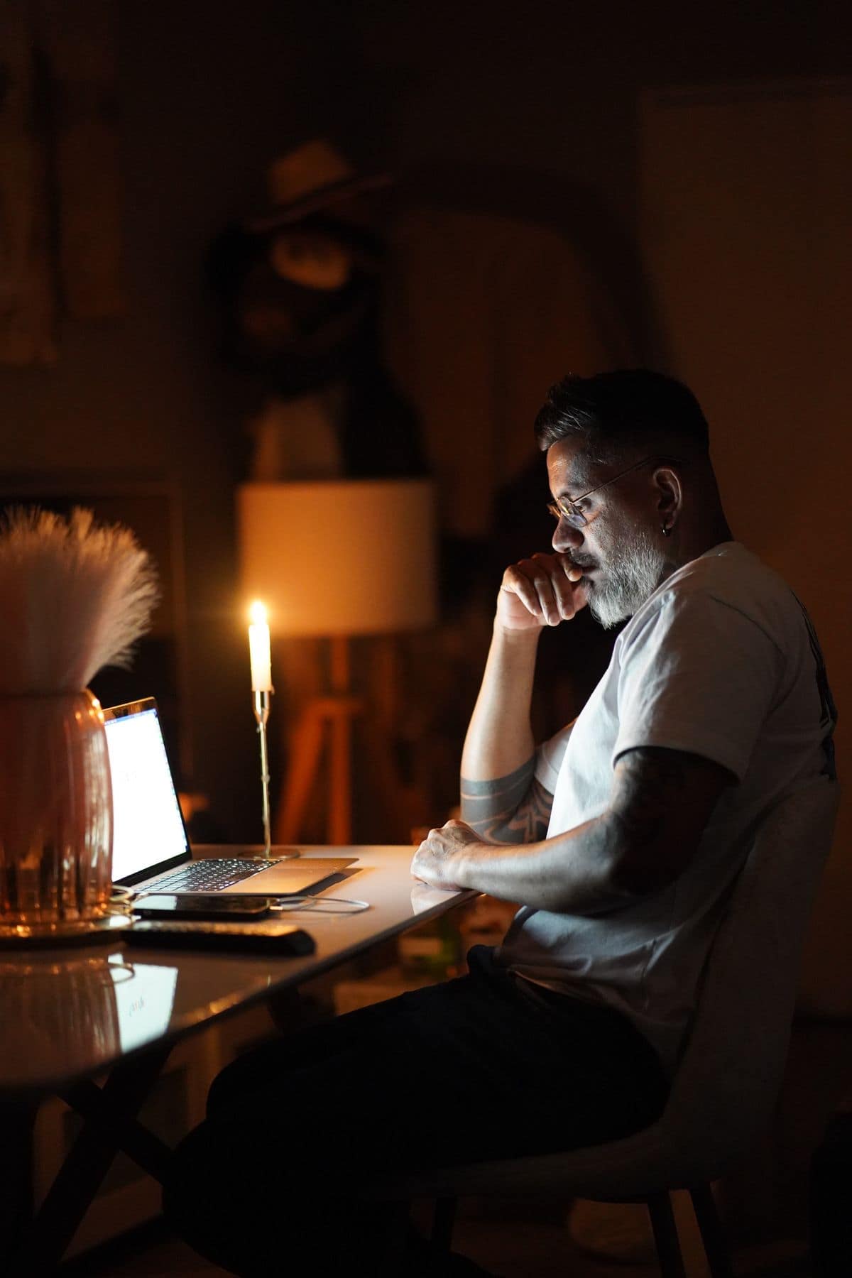 Business owner working on the books late at night