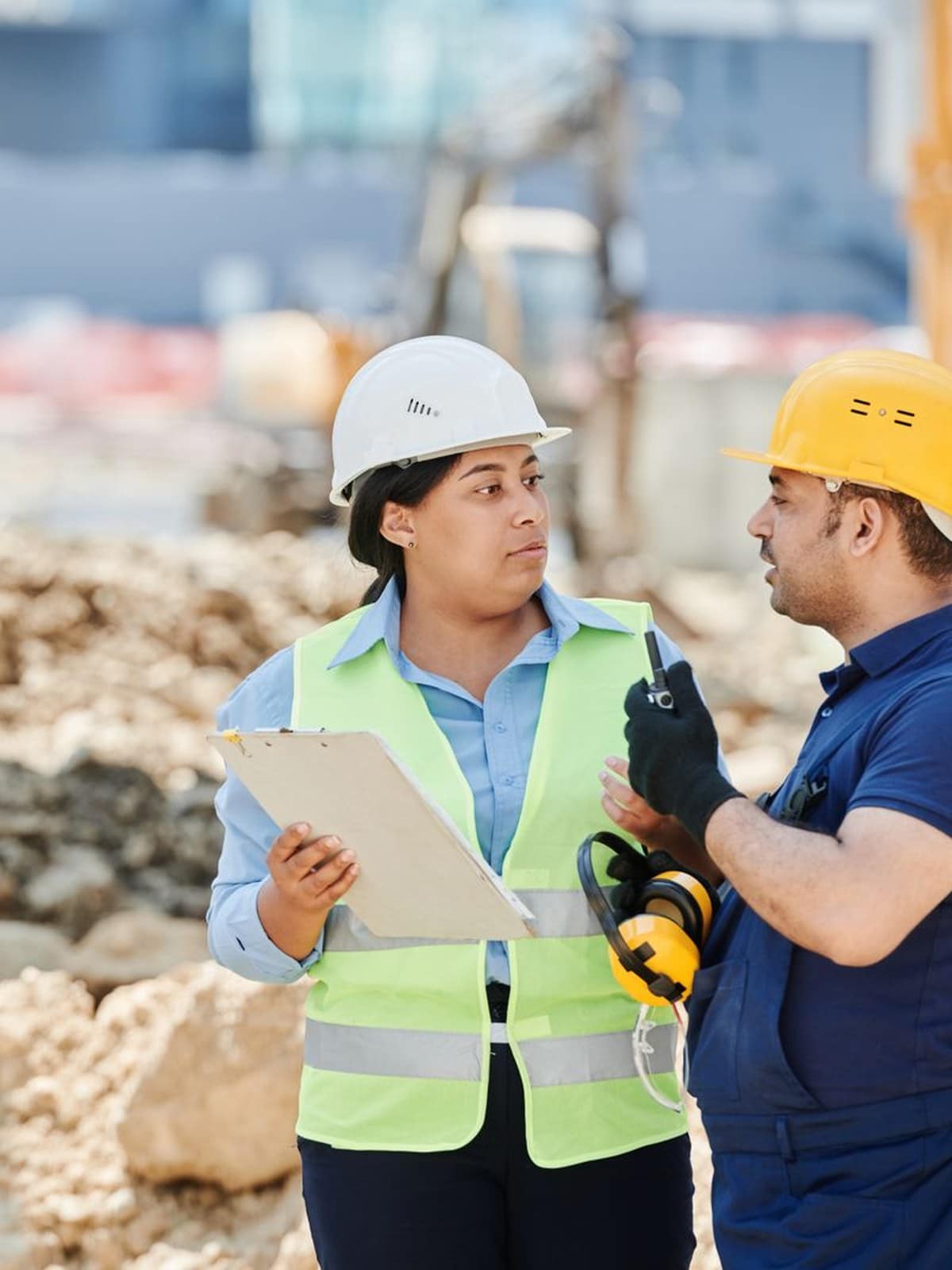 Commercial construction professionals reviewing work on site