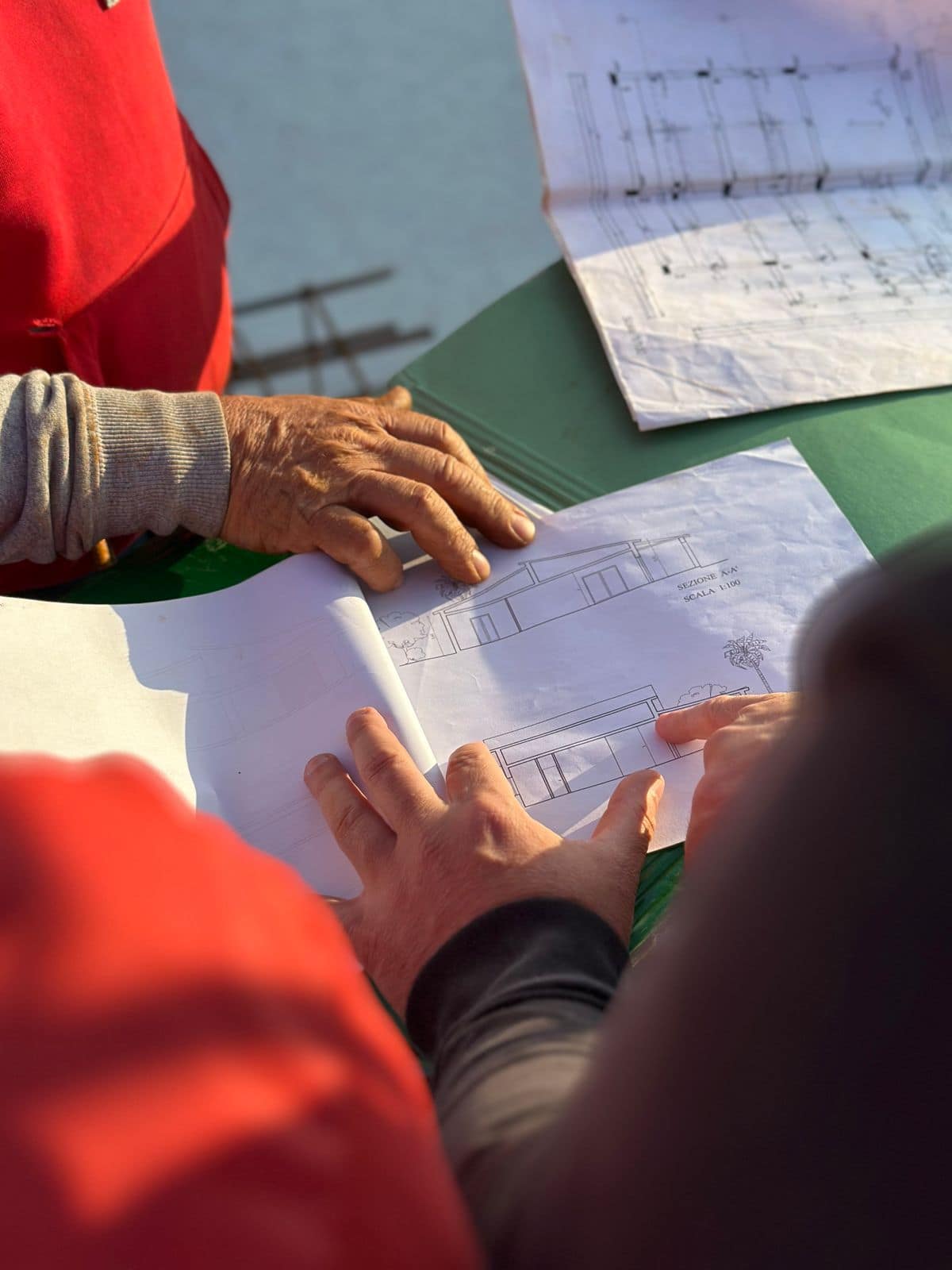 Commercial construction professionals reviewing work on site